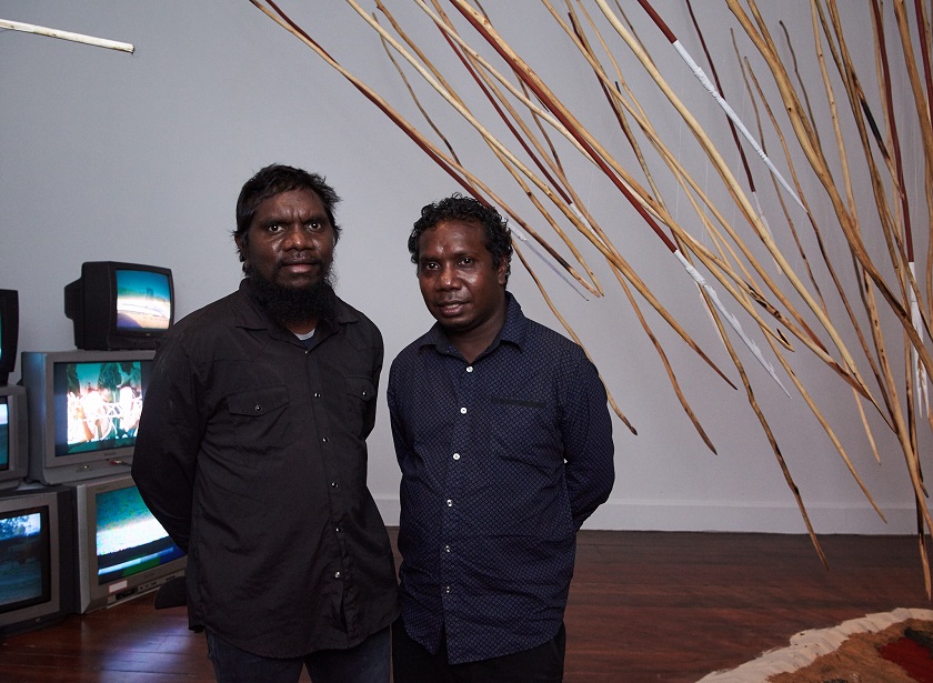 Artists Curtis Taylor and Ishmael Marika at In Cahoots exhibition opening. Photography by Rebecca Mansell.
