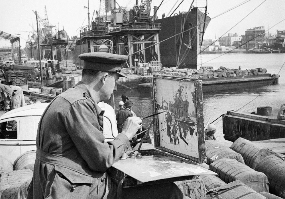 Unknown photographer, Frank Norton Official War Artist painting a scene of embarkation at Port Taufiq Suez Canal, 1942. Image courtesy of the Australian War Memorial no. 023666